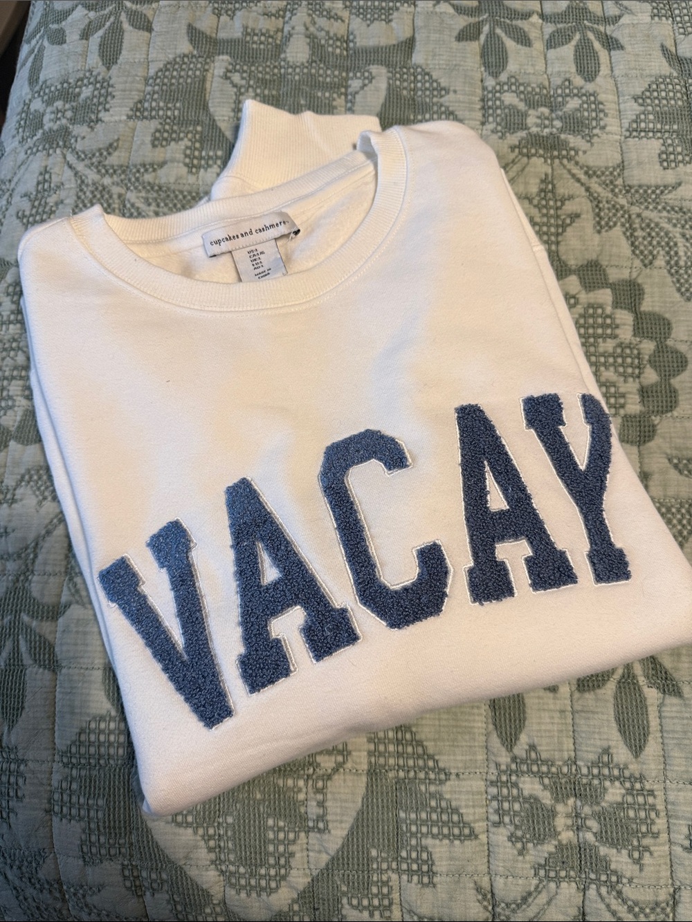 cupcakes & cashmere White Crewneck Sweater with Blue 'VACAY' Applique